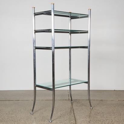 A Freestanding Almunium and Glass Shelving Unit