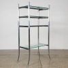 A Freestanding Almunium and Glass Shelving Unit