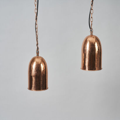 A Pair of Copper Pendants