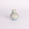 An Oil Jug by Greg Barron & Jin Ling
