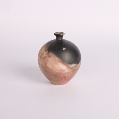 A Raku Fired Orb Vase