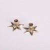 A Pair Of Mid Century Star Candle Holders