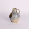 A Mark Goody Vase with a Handprints Wahine to Side