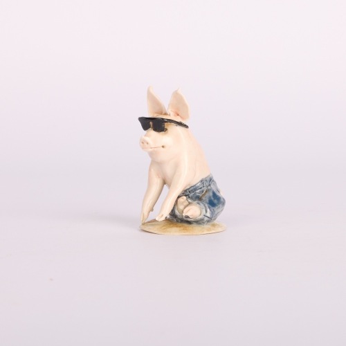 A Small Handmade Ceramic Cool Pig