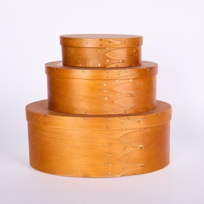 A Set Of Three Ply Shaker Boxes