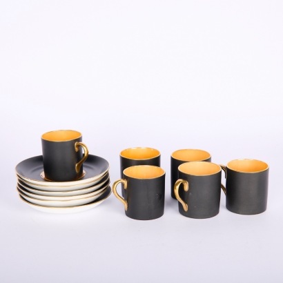 An Art Deco Matte Black and Gold Espresso Cups