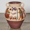 An Impressive Handpainted Pottery Urn with Peruvian Symbols and Figurines
