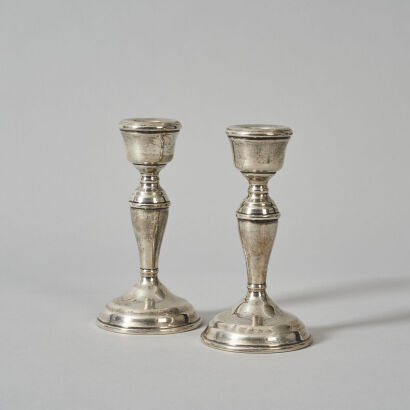 A Pair of Sterling Silver Candlesticks