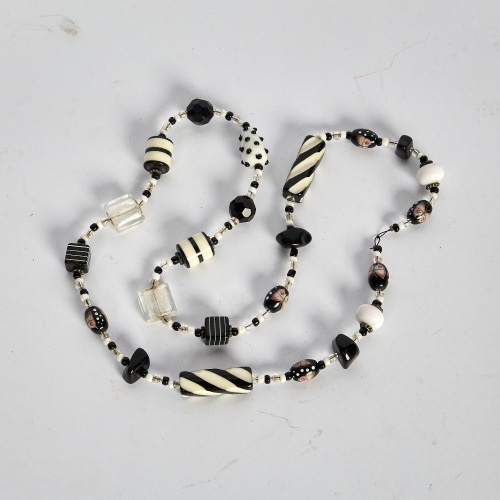 A Glass and Plastic Beaded Necklace