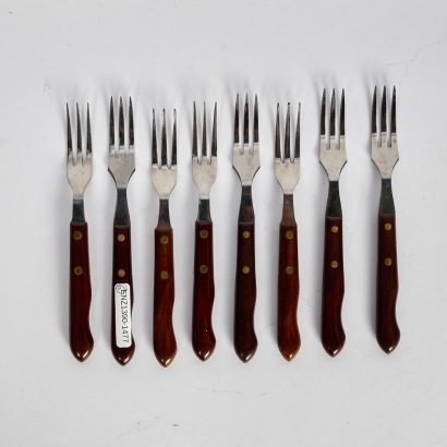 A collection of six Mid-century Teak Handled Steak Forks