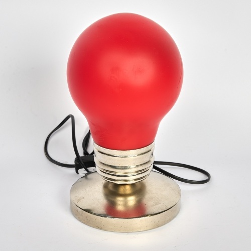 A Red Oversized Light Bulb Lamp
