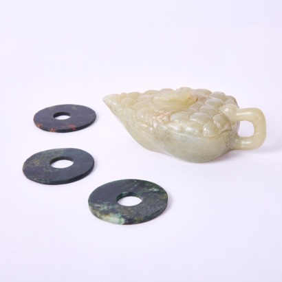 A Chinese Carved Celadon Jade Teapot AND A Set of Three Archaistic Black Jade Bi Discs