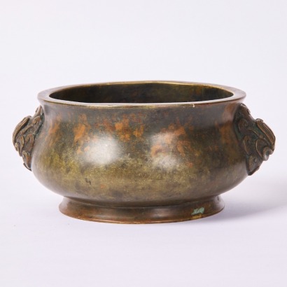 A Chinese Handled Aged Bronze Censer (Da Ming Xuande Year Mark)