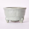 A Chinese Song-Yuan Dynasty Longquan Celadon 'Eight Trigram' Tripod Censer