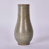 A Chinese Northern Song Dynasty Longquan Celadon Carved Bottle Vase