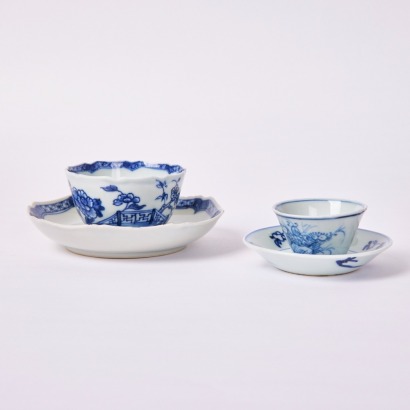 A Set of Two Chinese 18th Century Qing Dynasty Blue and White 'Floral' Cups and Saucers