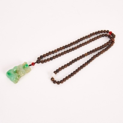 A Chinese 19th Century Qing Dynasty Jadeite Qilin Pendant with Agarwood Beads