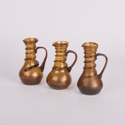 A Trio of Glass Vessels with Applied Spiral Detailing