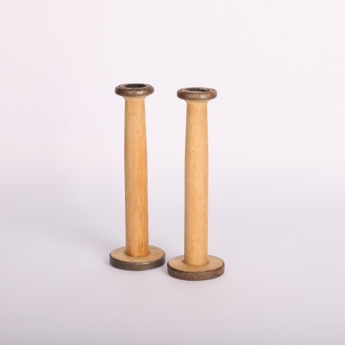 A Pair of Clayton Bradford Wood Candle Sticks