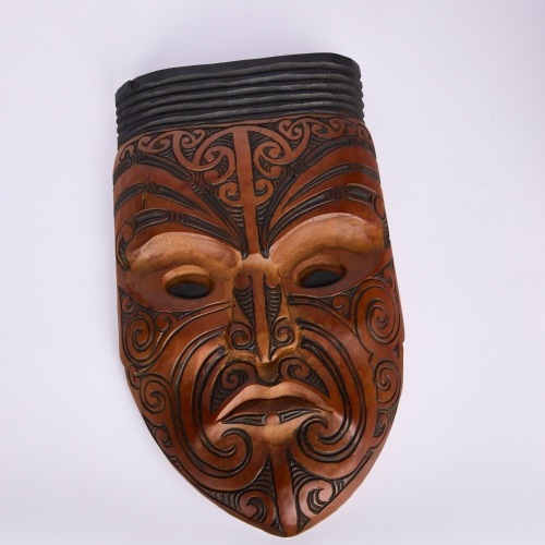 A Tony Kapua Carved Mask