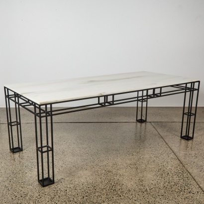 A Leccio Marble Dining Table Designed By Ceci Thompson for Crate and Barrel