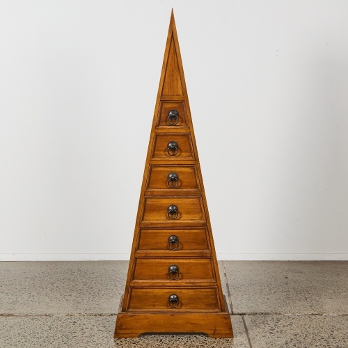 A Pyramid Form Wood Chest of Drawers