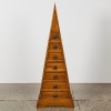 A Pyramid Form Wood Chest of Drawers