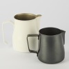 A Motta Black and White Coffee Milk Steaming Jugs