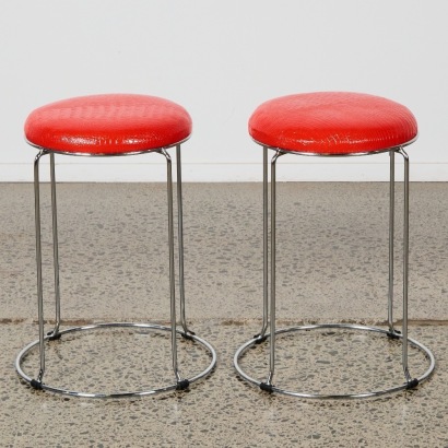 A Pair of Red Crocodile Embossed Stools