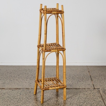 A Vintage 3 Tier Cane Plant Stand