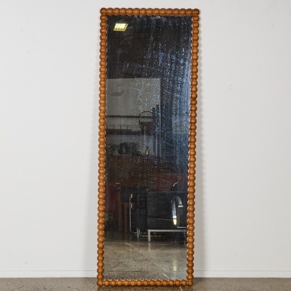 A Large Walnut-Coloured Bobbin Mirror