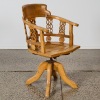 An Aged Wooden Armchair with Swivel Seat