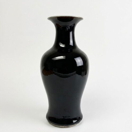 A Chinese 17th to 18th Century Kangxi Period Black-glazed Guanyin Vase