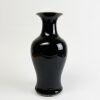 A Chinese 17th to 18th Century Kangxi Period Black-glazed Guanyin Vase