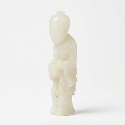 A Chinese Qing Dynasty Carved White Hetian Jade Figure