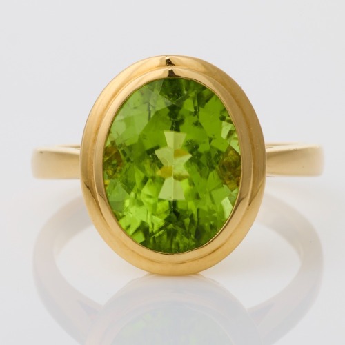 18ct Yellow Gold, 5.15ct Oval Mixed Cut Peridot Ring