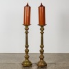 A Pair of Large Ornamental Candlesticks with Wooden Candles