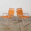 A Pair of Retro Orange Folding Chairs