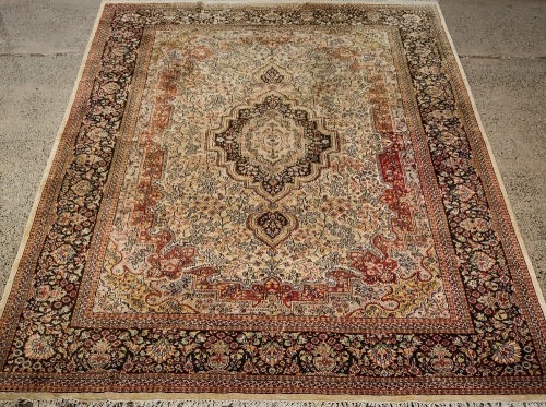 A Large Isfahan Hand-Knotted Silk and Wool Rug