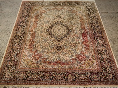 A Large Isfahan Hand-Knotted Silk and Wool Rug