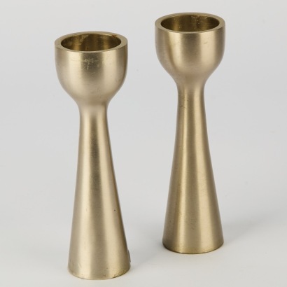 A Pair of Modernist Brushed Stainless Steel Candleholders