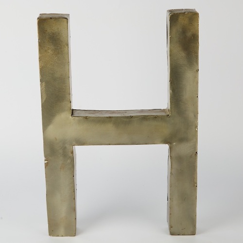 A Large Metal Letter 'H' Wall Sign