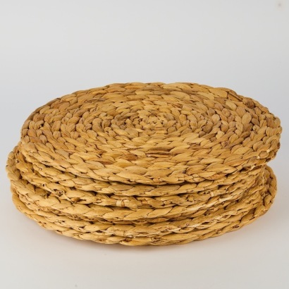 A Set of Eight Woven Placemats