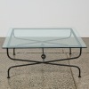 A Glass and Metal Coffee Table - 3