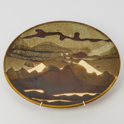 A Chris Dunn Ceramics Wall Plate