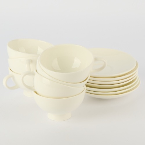 A Set of Seven Royal Doulton Symmetry Cups and Saucers