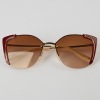 A Pair of Burgandy Prada Sunglasses