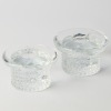 A Pair of Swedish Kosta Boda Daisy Candle Holders