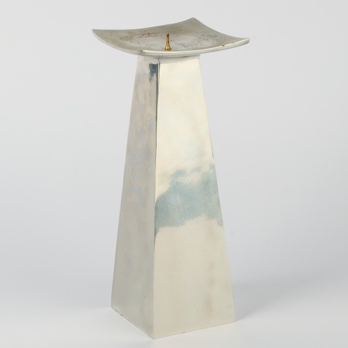 An Aluminium Pillar Candle Holder