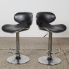 A Pair of Saddle-Seat Bar Stools